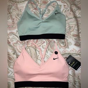 Two (2) Nike Sports Bras, size M, sea foam green and light pink, never worn.